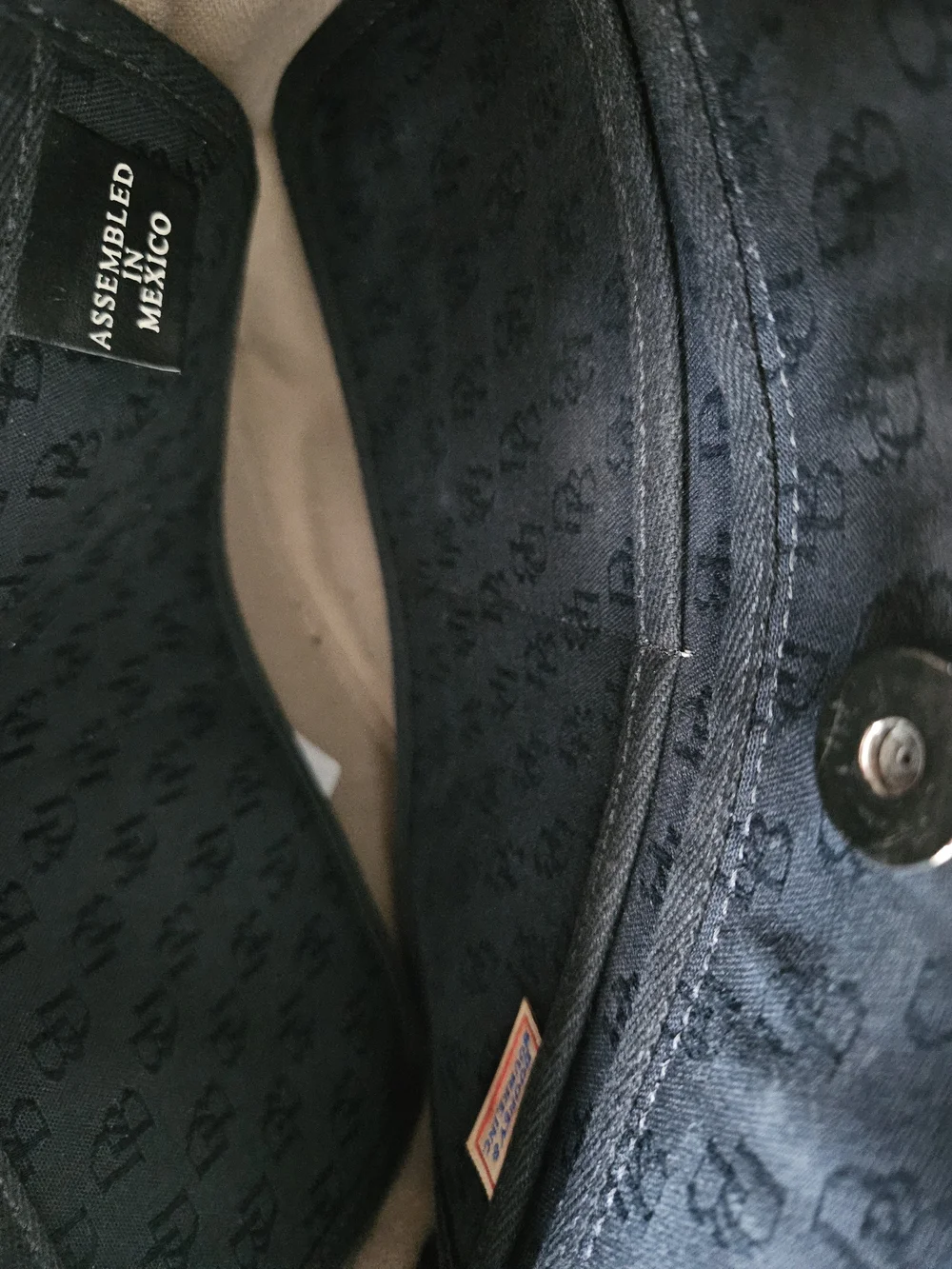 Dooney & Bourke Black On Black Monogram Drawstring Tote
